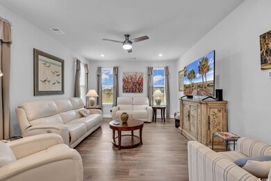 Living room featuring dark hardwood / wood-style f