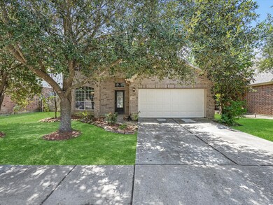 This is a single-story brick home featuring a two-