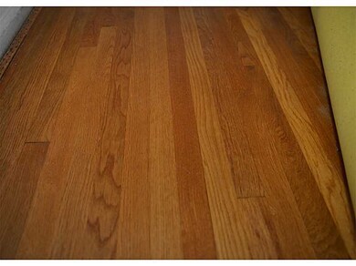 Living Room. Beautiful hardwood floor  under livin