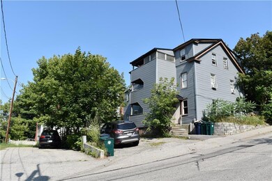 View from street. Both driveways...
