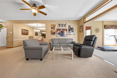 The LR is open to the formal dining room and 4 Sea