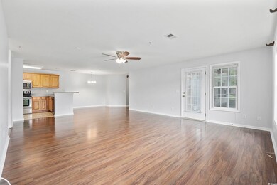 Unfurnished living room with light wood-type floor