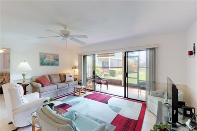 Lovely living room attached to screened in patio o
