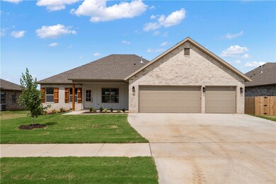 3-car garage with large driveway