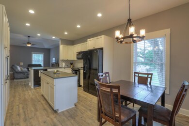 Your chef's eat in kitchen features granite counter tops, and new appliances. 