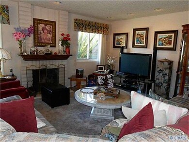Living room with cozy fireplace.