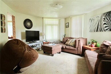 1st floor unit has large living space with lots of