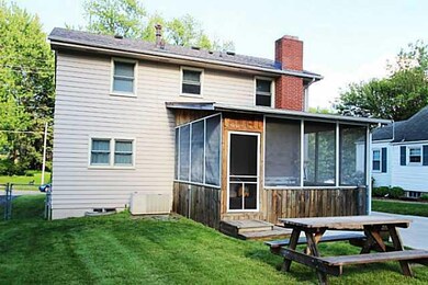Exterior Front. a fairly private backyard with scr