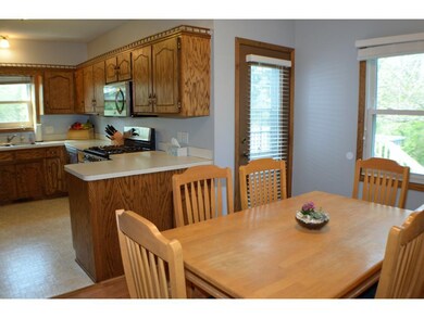 The dining area is located right off the kitchen w