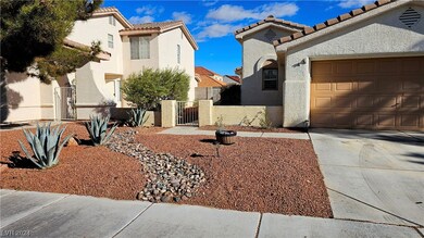 Fresh updated desert landscaping.
