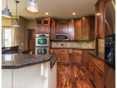Rich and vibrant custom tile work adds warmth to t