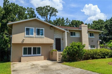 Bi-Level, Block Home with 4 Bedrooms / 3 Baths wit
