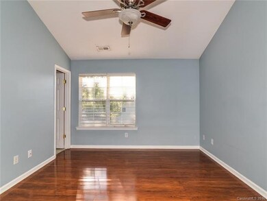 Large Master Suite with beautiful hardwood floors and ceiling fan!