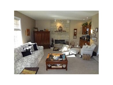 1st floor family room, limestone wood burning fire
