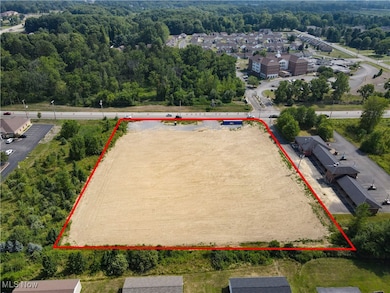 Aerial view of property and surrounding area with property boundaries highlighted