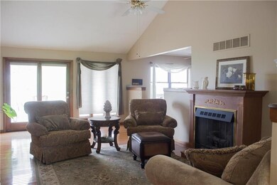 Living Room with Vaulted Ceiling, Hardwood Floors 