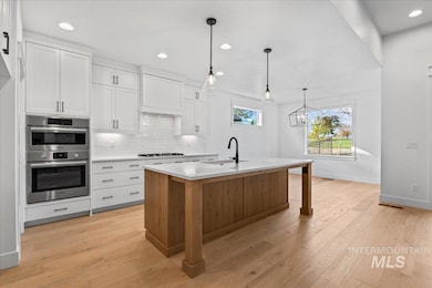 12014 W Zamalek Ct, Kuna, ID 83634 - photo 4