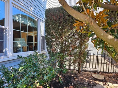 Sliding doors lead to relaxing outdoor patio