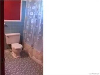 One of 3 full baths. The tile is all in great shap