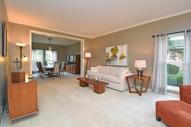 The formal Living Room has beautiful windows, cust