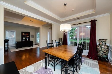 Formal dining room with a beautiful tray ceiling!