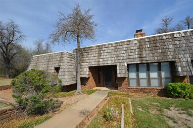 Front sidewalk to the covered porch area. Note the