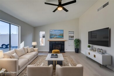 Living area with light wood-type flooring, visible