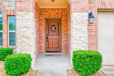 Covered Front Porch provides shade and shelter from the rain.