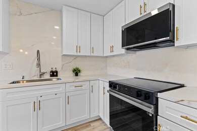 21921 Rimhurst Dr unit 128, Lake Forest, CA 92630 - photo 6