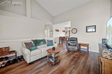 Living room featuring dark hardwood / wood-style f
