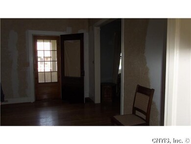 Living Room. Looking from the kitchen entry back t