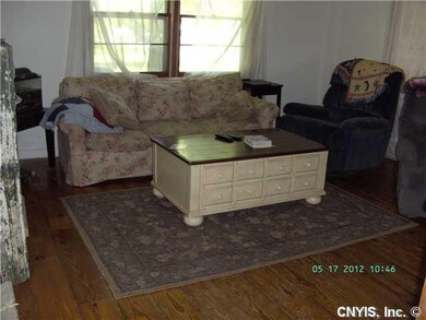 Living Room Offers Entry to 2nd staircase  up