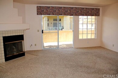 Sliding doors from the living room step out to the