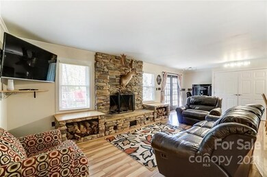 Open floor plan with a beautiful wood burning fire