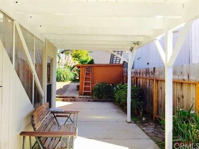 Lower covered patio is breezy yet bright.
