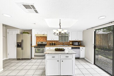 Kitchen with abundance of natural light.