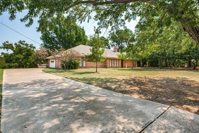 Long, partially shaded driveway