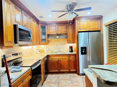 Kitchen featuring new stainless steel appliances,