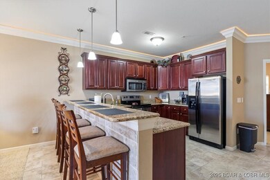 Custom cabinetry with Crown Molding, SS Appliances