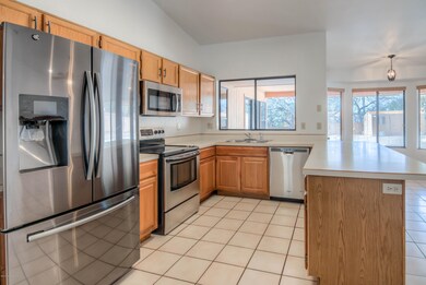 Open Kitchen with Stainless Appliances