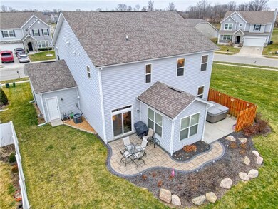 Sliding door from breakfast room leads to paver patio. Door from sunroom leads to hot tub. Service door to 3-car garage