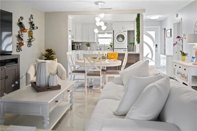 Living area with visible vents, marble finish floo