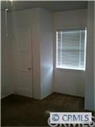 Front bedroom with window.