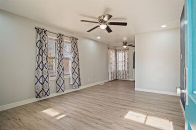 Unfurnished room featuring ceiling fan and light h