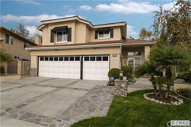 There is a long, private driveway with additional 