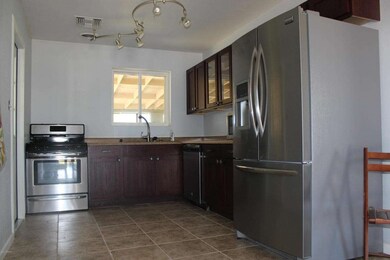 Kitchen with Tile, Stainless Appliances