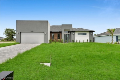Contemporary house with an attached garage, decora