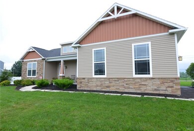 Stone trim, Craftsman style accents and side load 