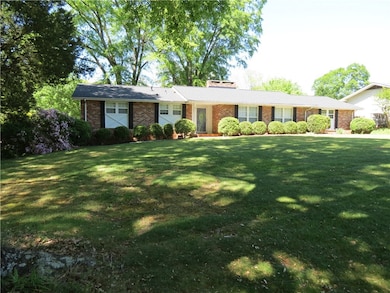 Perfect shade trees and lovely azaleas here and th