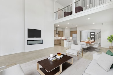 Open Floor Plan in the Da Vinci II home plan by Trophy Signature Homes – REPRESENTATIVE PHOTO